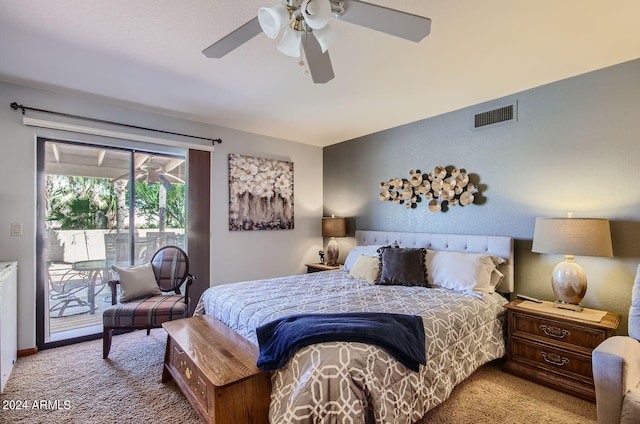 carpeted bedroom with access to exterior, ceiling fan, and visible vents