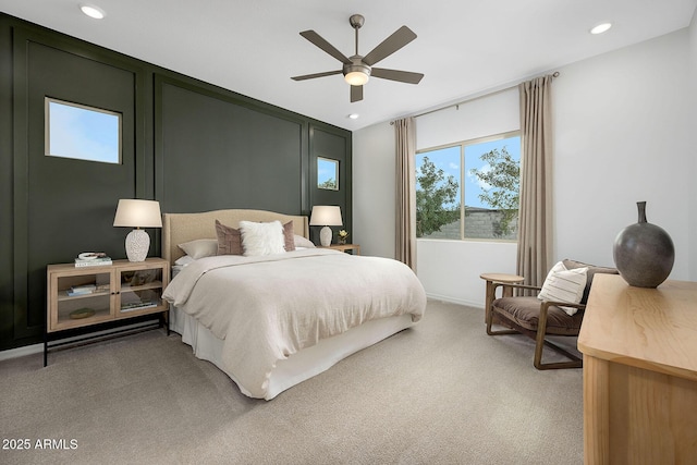 carpeted bedroom with ceiling fan