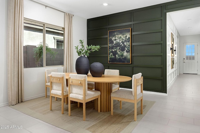 dining area with light tile patterned floors