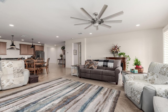 living room featuring ceiling fan