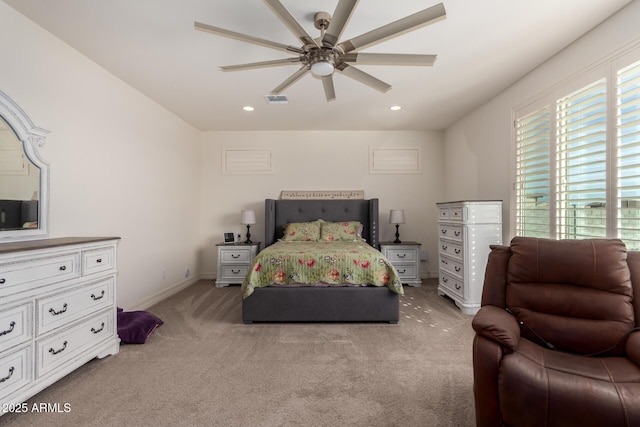 carpeted bedroom with ceiling fan