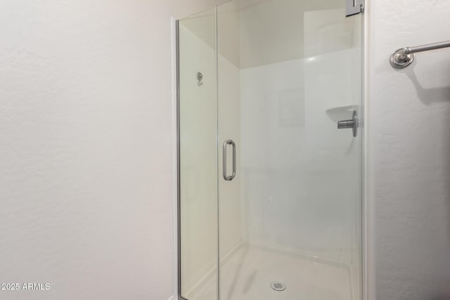 bathroom with an enclosed shower