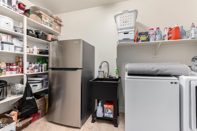 laundry area with sink