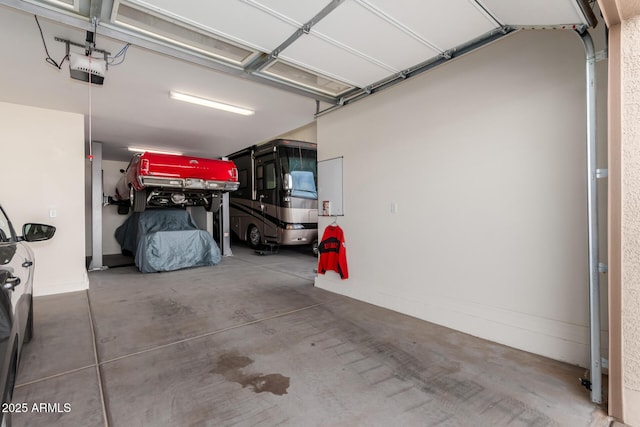 garage featuring a garage door opener