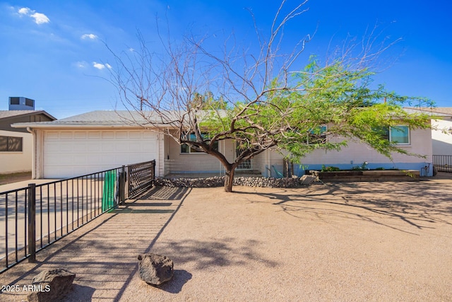 62 W Beall Ave, Mesa, AZ 85210 - view of front facade with driveway and an attached garage