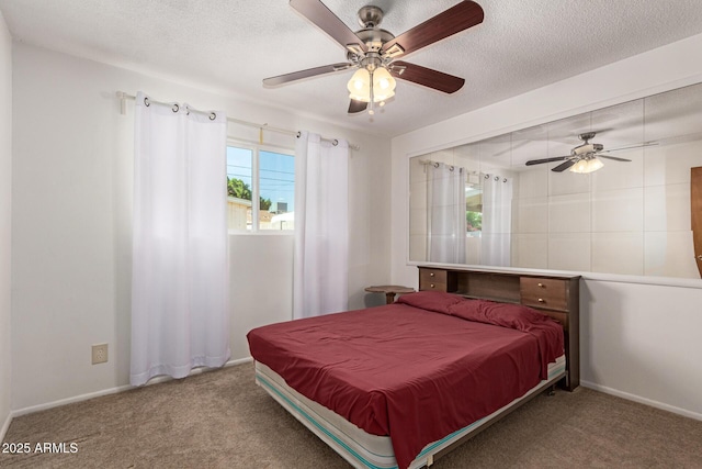 62 W Beall Ave, Mesa, AZ 85210 - carpeted bedroom featuring a ceiling fan, a textured ceiling, and baseboards