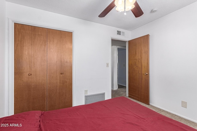 62 W Beall Ave, Mesa, AZ 85210 - carpeted bedroom featuring a closet, baseboards, and a ceiling fan