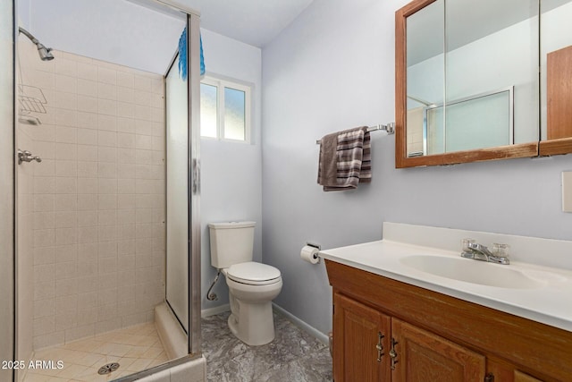 62 W Beall Ave, Mesa, AZ 85210 - bathroom with vanity, a stall shower, toilet, and baseboards