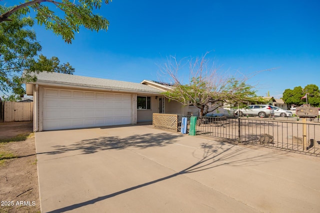 62 W Beall Ave, Mesa, AZ 85210 - ranch-style house featuring concrete driveway, a garage, and a gate