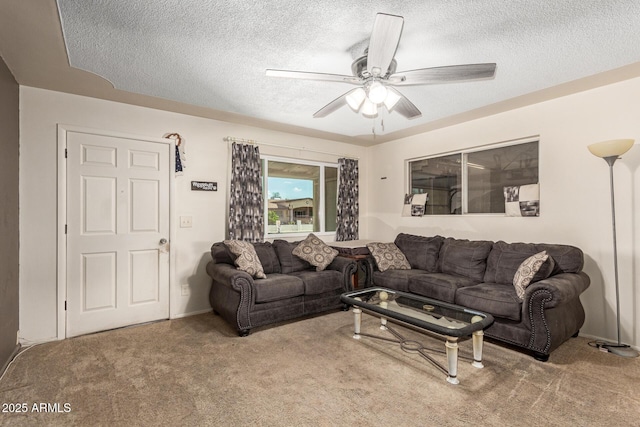 62 W Beall Ave, Mesa, AZ 85210 - living room with ceiling fan, carpet floors, and a textured ceiling