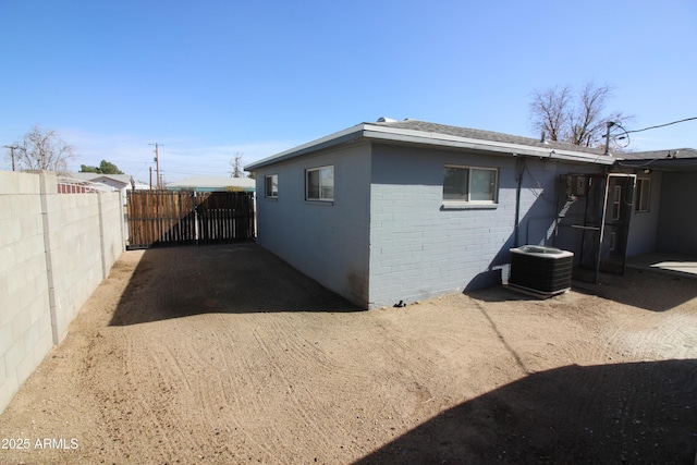 view of property exterior featuring central AC