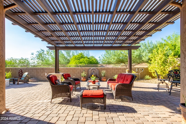 view of patio / terrace with a fenced backyard, an outdoor living space, and a pergola