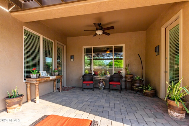 view of patio with ceiling fan