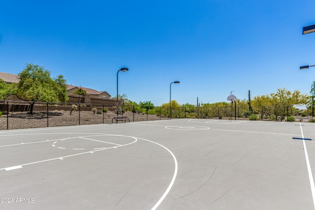 view of sport court with community basketball court and fence