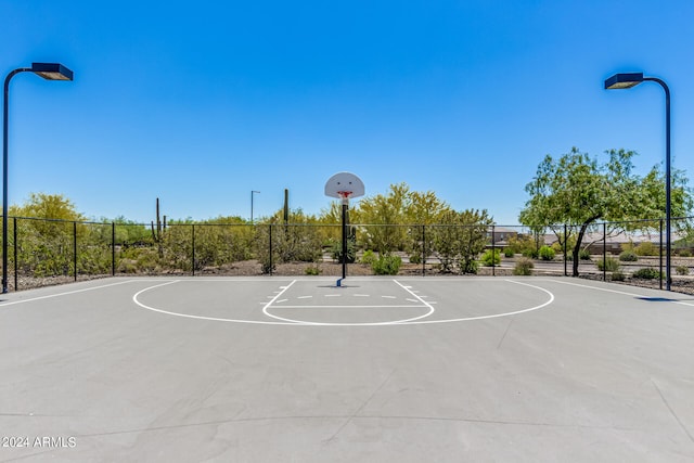 view of sport court with community basketball court and fence