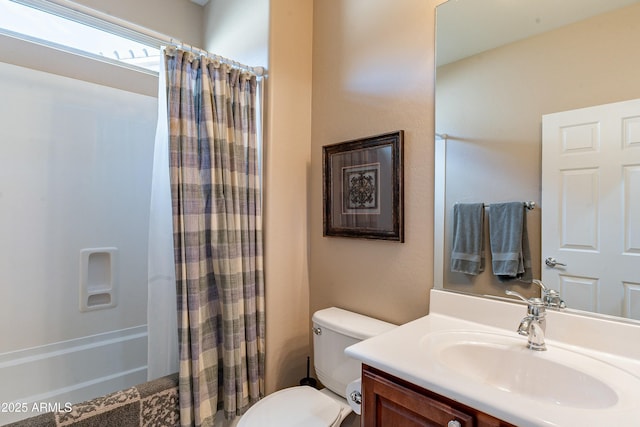 full bathroom with toilet, shower / bath combo with shower curtain, and vanity