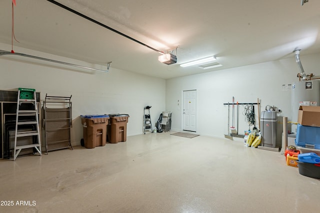 garage featuring a garage door opener and water heater