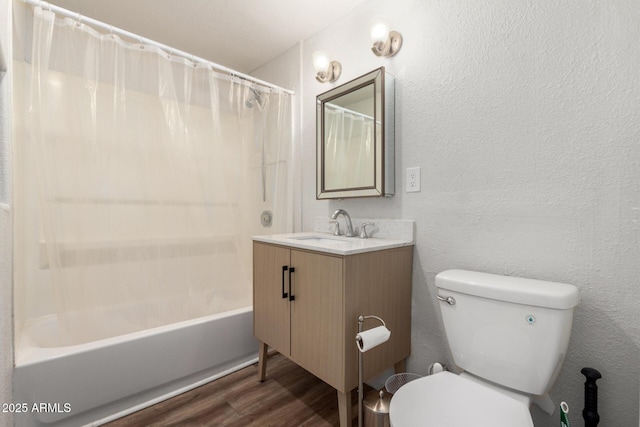 1424 S Bonarden Ln, Tempe, AZ 85281 - bathroom with shower / bath combination with curtain, toilet, a textured wall, vanity, and wood finished floors