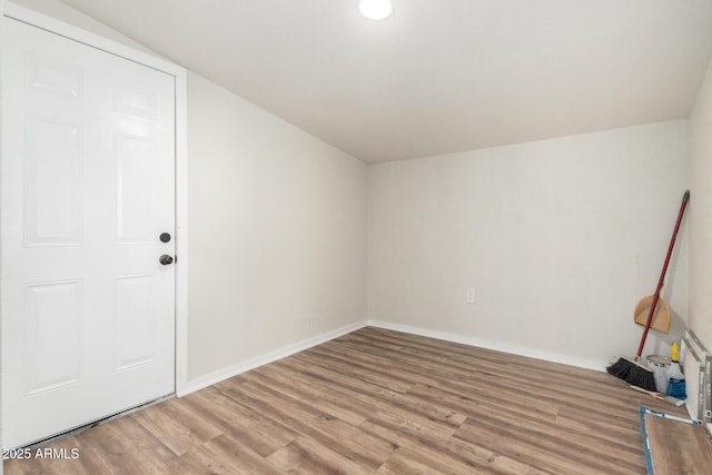 1424 S Bonarden Ln, Tempe, AZ 85281 - spare room with light wood-type flooring and baseboards