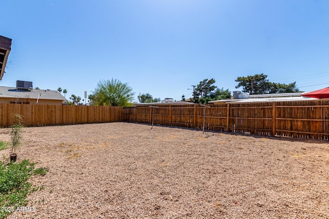 1424 S Bonarden Ln, Tempe, AZ 85281 - view of yard with a fenced backyard and central AC