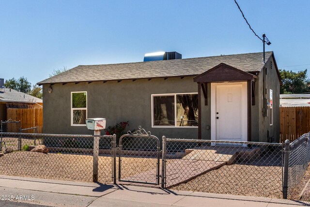 1424 S Bonarden Ln, Tempe, AZ 85281 - bungalow-style home featuring a gate, fence, a shingled roof, and stucco siding