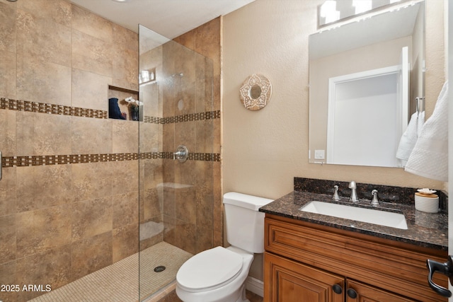 2726 E Fairmount Ave, Phoenix, AZ 85016 - full bath featuring vanity, a tile shower, and toilet