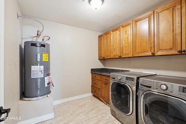 2726 E Fairmount Ave, Phoenix, AZ 85016 - laundry room with baseboards, cabinet space, washing machine and clothes dryer, and electric water heater