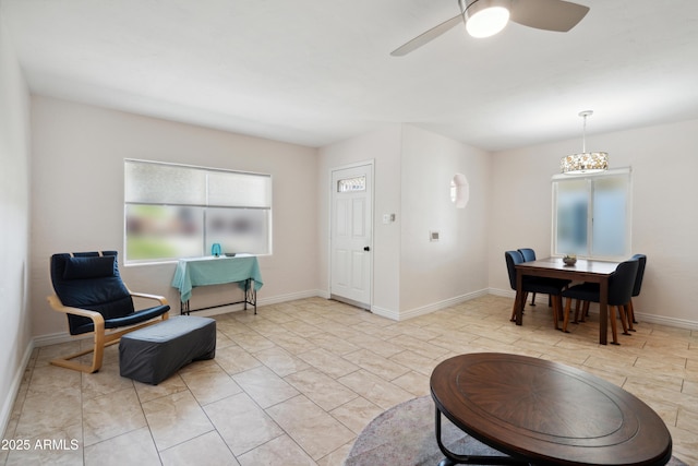 2726 E Fairmount Ave, Phoenix, AZ 85016 - living area with baseboards and a ceiling fan