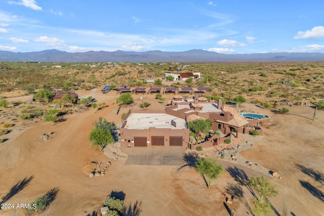 drone / aerial view featuring a mountain view