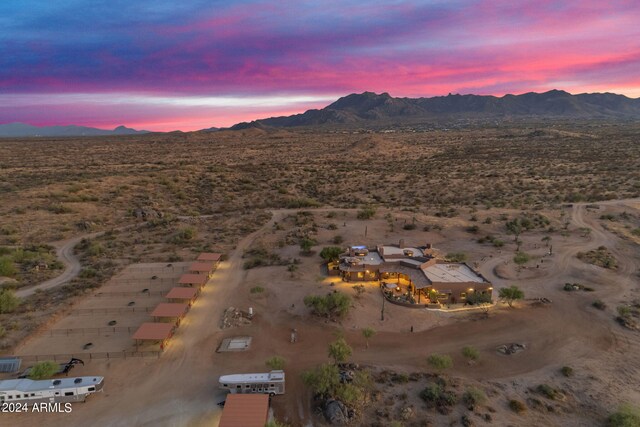 aerial view at dusk with a mountain view