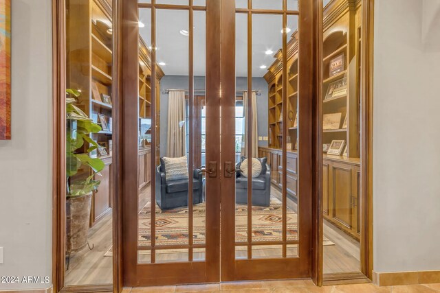 interior space featuring french doors and tile patterned floors