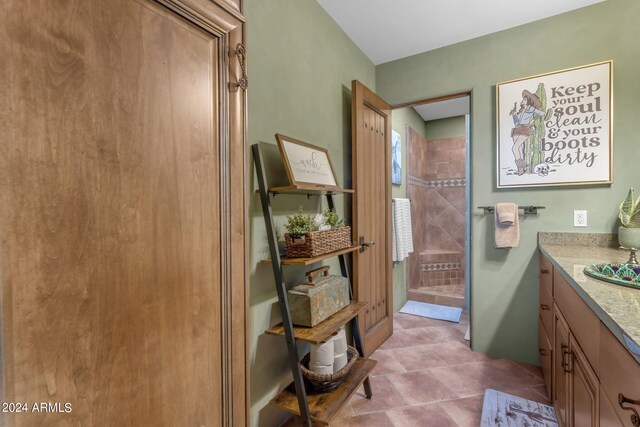 bathroom with vanity and tile patterned floors