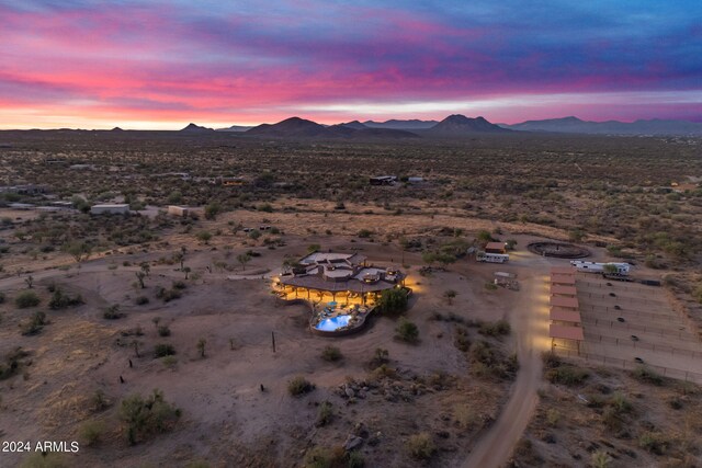 aerial view at dusk with a mountain view