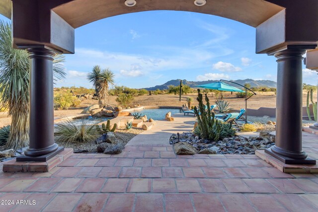 view of patio with a mountain view