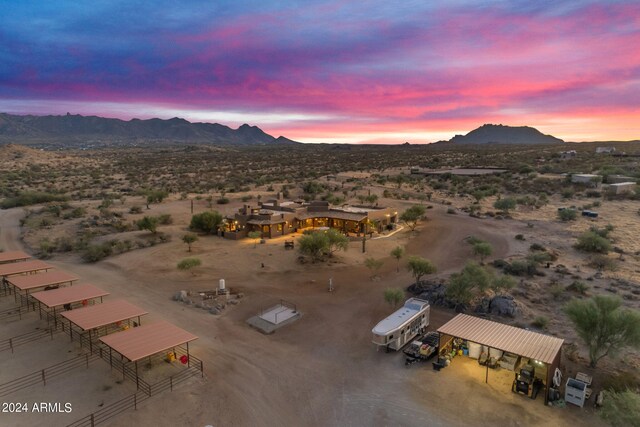 aerial view at dusk with a mountain view