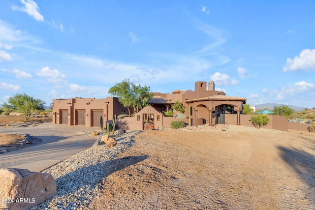 view of pueblo revival-style home