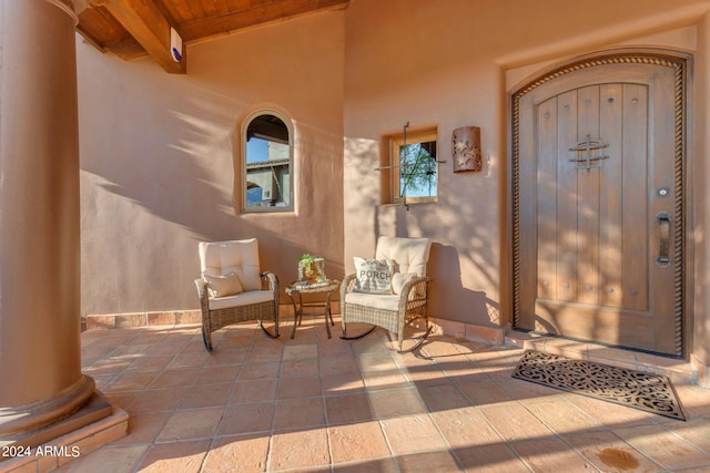 property entrance with a patio