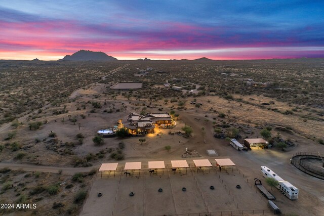 aerial view at dusk with a mountain view