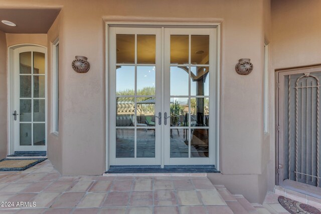 entrance to property with french doors