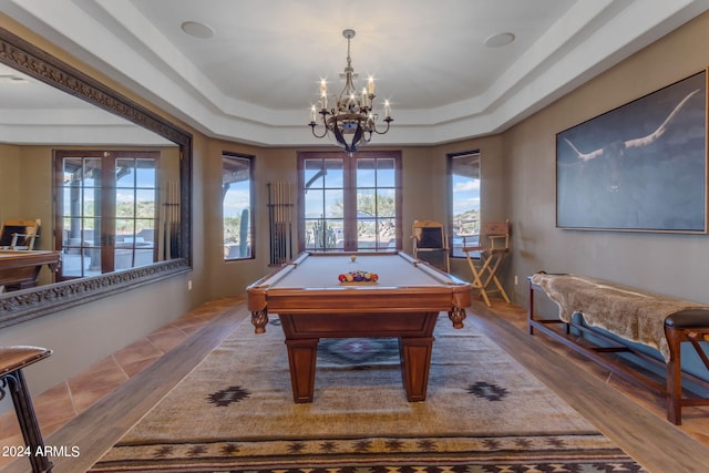 rec room with a tray ceiling, french doors, and pool table