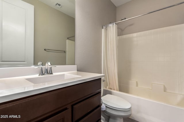 bathroom with toilet, shower / bath combo, visible vents, and vanity