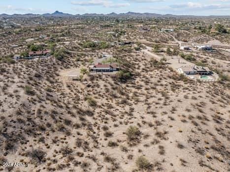 drone / aerial view featuring a mountain view