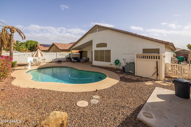 view of swimming pool featuring a patio