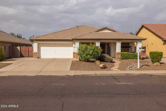 view of front of property with a garage