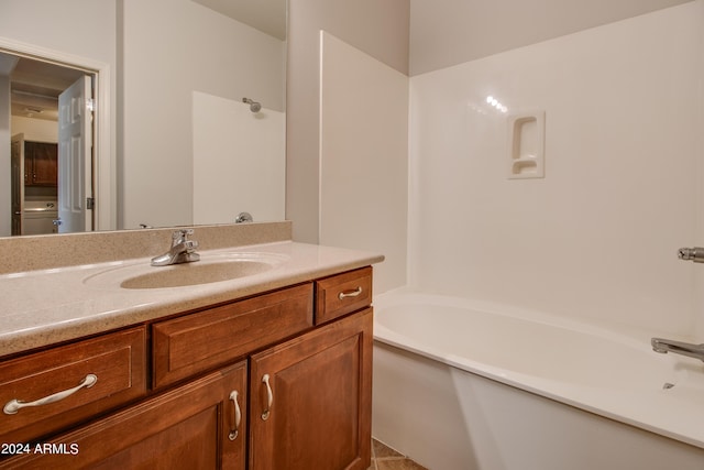 bathroom featuring vanity and tub / shower combination