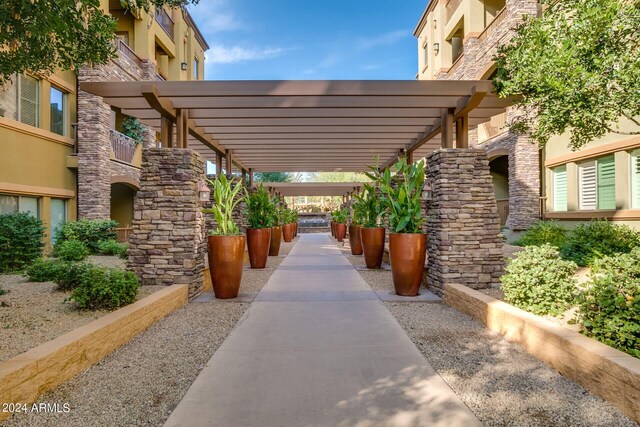 exterior space with a pergola