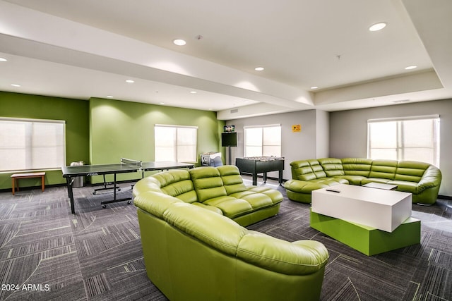 playroom featuring dark colored carpet