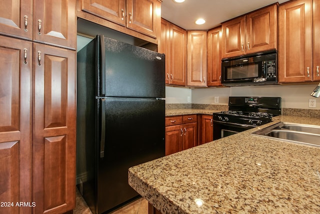 kitchen with black appliances