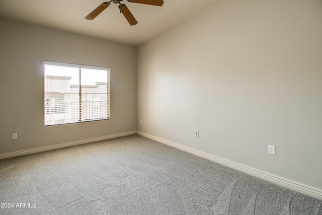 carpeted empty room with ceiling fan