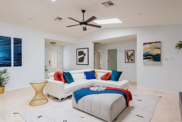 8338 E Monterosa St, Scottsdale, AZ 85251 - living room featuring vaulted ceiling with skylight, visible vents, ceiling fan, and light tile patterned flooring